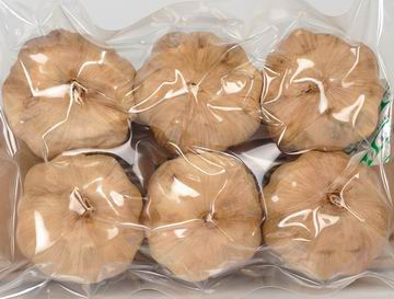 black garlic in vacuum bags